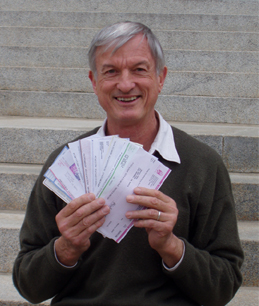 David Cook with checks from teaching